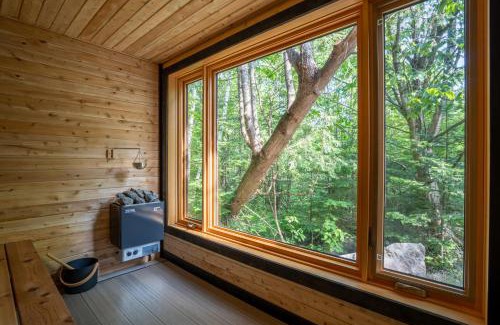 Adstock Chalet De Esquí | Évasion Nature Adstock - Sauna, Ski & Spa