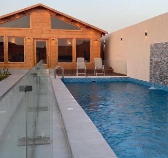 Al Kura Chalet De Esquí | أكواخ باشن الريفية
