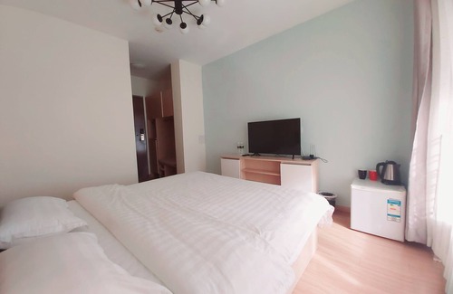 Chengyang Apartamento | 青春球场，世纪公园，青岛国家广告产业园丰富美食