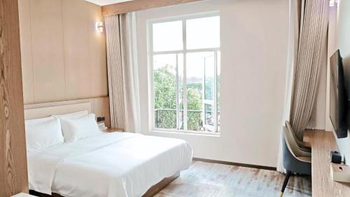 Vientiane Hotel | 鸿业远图酒店