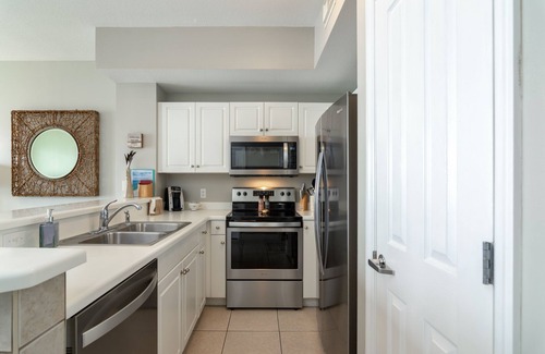 Miramar Beach Condominio | ¡Nuevo listado! Grandes tasas de caída! Gran balcón privado. Sillas de playa incluidas!