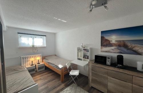 Eichsfelder Kessel Apartamento | 1-Raum Ferienwohnung Souterrain Niederorschel