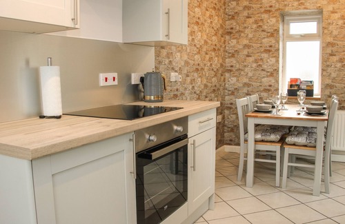 Four Crosses Cabaña | 1 SARNWEN COTTAGES, pet friendly, with open fire in Four Crosses