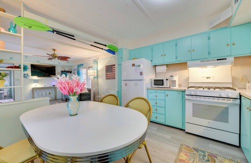 Kalkaska Casa | Walk to Manistee Lake: Retro Cottage w/ Fire Pit!