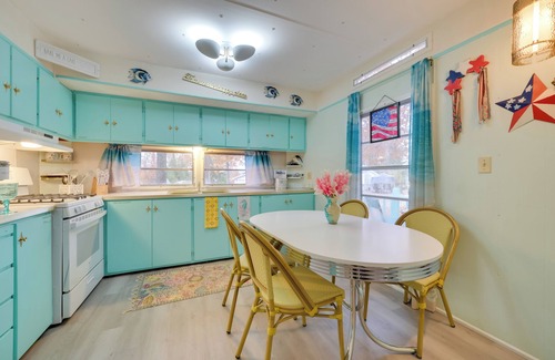 Kalkaska Casa | Walk to Manistee Lake: Retro Cottage w/ Fire Pit!