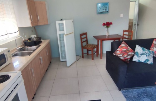Bon Accord Village Condominio | 1BR Condo - En el corazón de Crown Point Tobago. Las mejores playas a la vuelta de la esquina