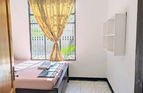 Dar es Salaam Apartamento | 2 Bedroom spacious Cozy Home,10 min Walk to Beach