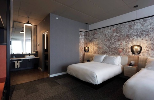 Brossard Hotel | 2 Comfortable Rooms w/Work-Ready Space + Family-Friendly Layout in Brossard