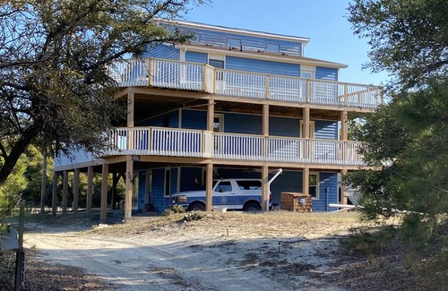 Carova Beach Casa | 2 Free beach parking passes! Waterfront Hot Tub Boat dock Pet friendly 360 Decks