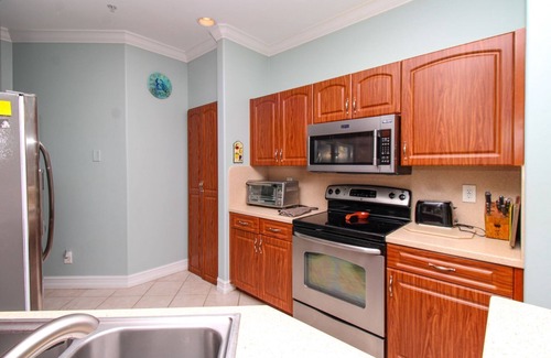 North Naples Condominio | 2 PLUS DEN2 BATH CONDO IN BARBADOS AT TARPON COVE, 1ST FLOOR, SEASONAL