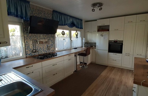 Paewesin Casa | Vacaciones de pesca, natación, recreación y senderismo para solteros y familias con perros.