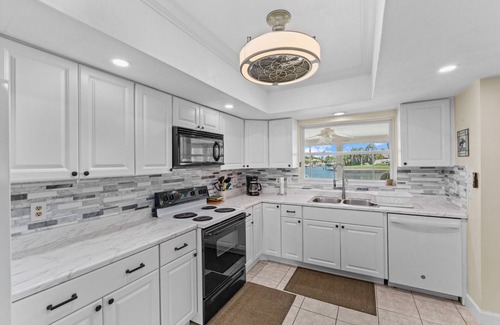 Gulf Harbors Casa | 3/2 Waterfront Canal Home w/ Private Pool, Kayaks, Gulf Access, Dock, Fishing, Dolphins