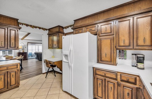 Owasso Casa | 4BR Retreat w/ KING Bed, Hot Tub & Prime Location