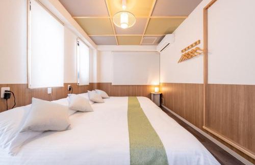 Higashishinsaibashi Apartamento | 5階 ホテル鶴 道頓堀に位置する宿 ベッド9台 シャワー2台 観光に最適