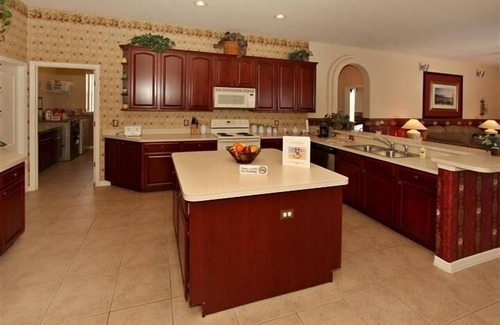 Grand Reserve Villa | Villa ejecutiva de 5 dormitorios, piscina grande, comunidad cerrada en Championsgate cerca de Disney