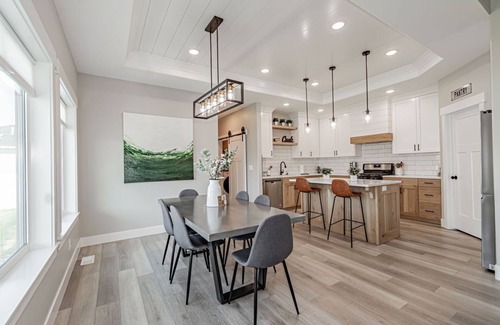 Idaho Falls Casa | 6 bed 3 bath home ~ sleeps 20! w/ game room, fireplace, hot tub & playground.