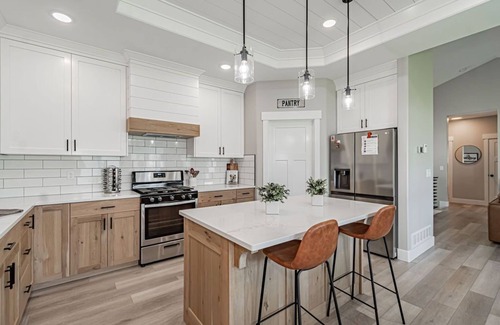 Idaho Falls Casa | 6 bed 3 bath home ~ sleeps 20! w/ game room, fireplace, hot tub & playground.