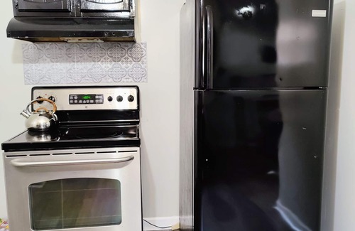 Treme Cabaña | 7 min walk to French Quarter Spacious Creole Cottage