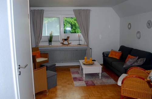 Dannewerk Apartamento | 70 sqm for up to 4 people in Dannewerk Schleswig-Holstein. Car parking space and storage room for e-bikes, washing machine, full bathroom with bathtub, high chair and travel cot are available Bedding for the travel cot please bring your own...