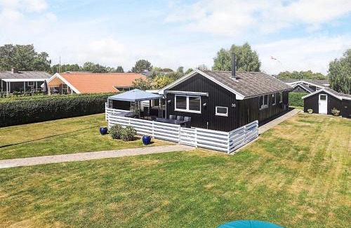 Hasmark Strand Casa | 8 person holiday home in Otterup