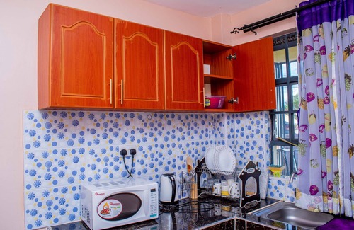 Kitale Condominio | A&B Cozy Apartment - Your Stylish Haven for Ultimate Comfort