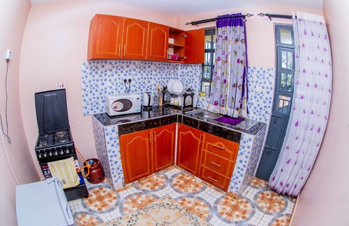 Kitale Condominio | A&B Cozy Apartment - Your Stylish Haven for Ultimate Comfort