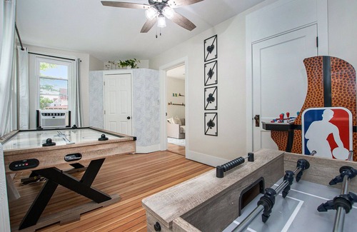 Ludington Casa | A block from the beach! Sleeps 20! Hot Tub, Game Room!