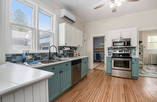 Ludington Casa | A block from the beach! Sleeps 20! Hot Tub, Game Room!