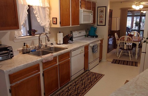 Ruidoso Cabina | A cozy cabin, pet friendly with covered deck surrounded by beautiful pine trees!