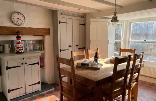 Tan-y-groes Casa | A delightful seaside stone cottage, just a minute's walk from the beach.