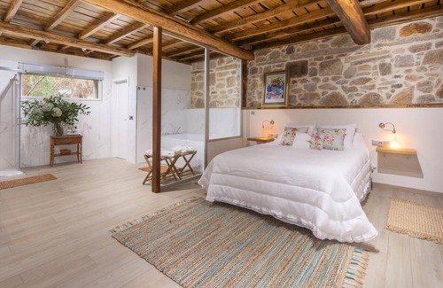 Puebla del Caraminal Cama Y Desayuno | A Palleira: antiguo pajar reformado al lado del río