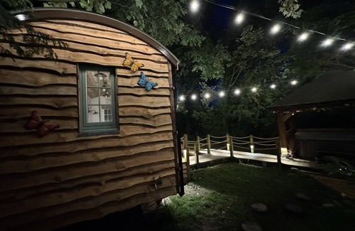 Warrington Cabina | A peaceful countryside retreat with a private hot tub and cozy log burner.