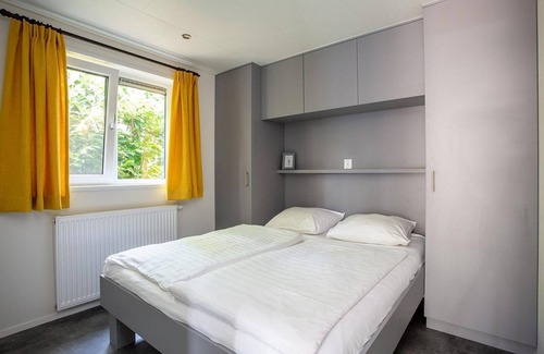 Rhenen Casa | A pleasant atmosphere, cozy furnishings and an open gazebo with lounge set! Nice that Forest Lodge!