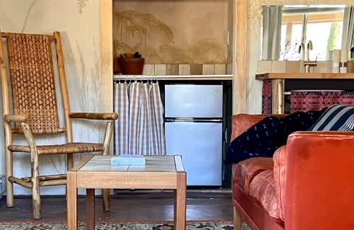 Cornville Casa | A private king studio with a kitchenette in the garden of Halliday House.