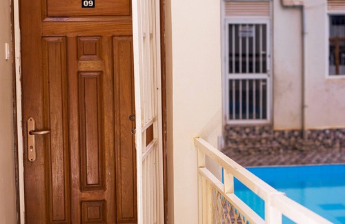 Bukoto Apartamento | A quiet one bedroom set with small gym and swimming pool.