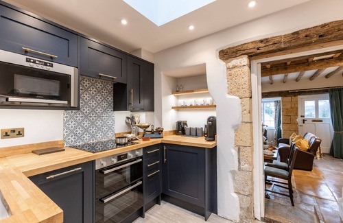 Blockley Apartamento | A stunning 17th Century three-storey terraced cottage.