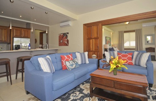 Cocoplum Condominio | El paraíso caribeño frente al mar en un jardín tropical te espera