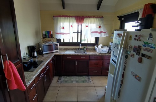 Tierras Morenas Casa | Acogedora casa en la montaña con piscina infinita