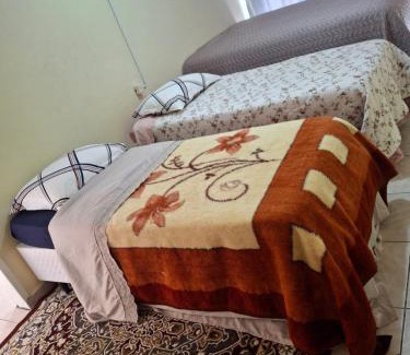 Orleans Casa | Acomodação quarto compartilhado
