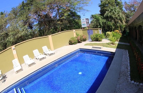 Potrero Cabina | Affordable Comfort in a 2-bed Hotel Room in Potrero With Pool - TV and AC