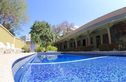 Potrero Cabina | Affordable Comfort in a 2-bed Hotel Room in Potrero With Pool - TV and AC