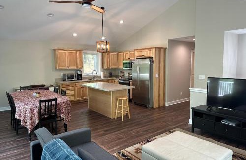 Great Cacapon Casa | All Decked Up - wifi, view, river access, fire pit, 3 bedrooms, games, family friendly