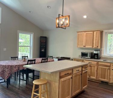 Great Cacapon Casa | All Decked Up - wifi, view, river access, fire pit, 3 bedrooms, games, family friendly