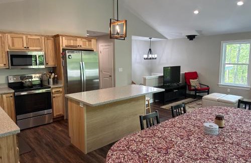 Great Cacapon Casa | All Decked Up - wifi, view, river access, fire pit, 3 bedrooms, games, family friendly