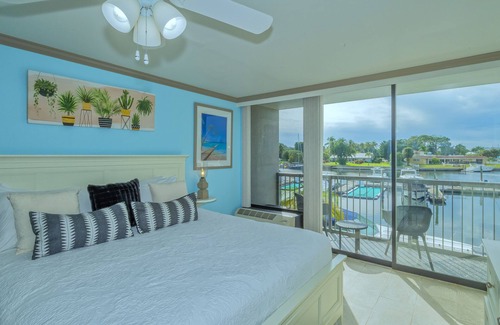 Trailer Estates Hotel | ALL-NEW Waterfront with Balcony, Pool, Tiki Bar, Gym