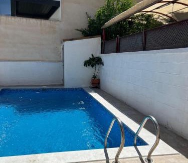 Zaidin Apartamento | Alquibla relax y armonía con piscina junto a restaurantes y supermercados