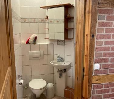 Hemmoor Apartamento | Altes Landhaus Oste, Klavier Appartement, 2 Zimmer mit Kamin