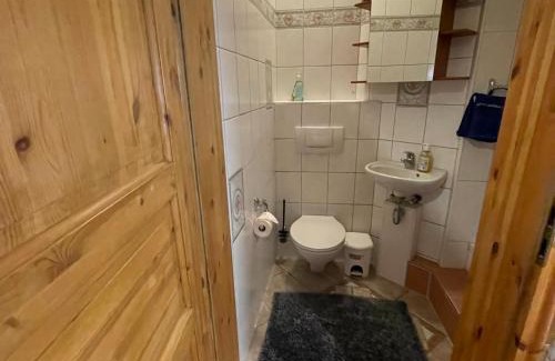 Hemmoor Apartamento | Altes Landhaus Oste, Klavier Appartement, 2 Zimmer mit Kamin