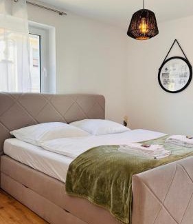 Elgersweier Apartamento | AMAO Pearl - Rollstuhlgerechte Suite - 94 qm - Balkon & Tiefgarage - Aufzug - Nähe Messe - bis 10 Pers 2Whg