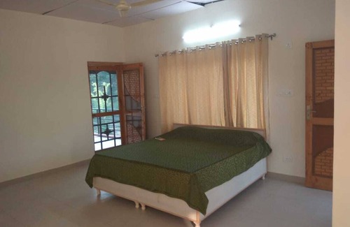 Gopalpur Casa | Una granja orgánica con instalaciones para residentes.